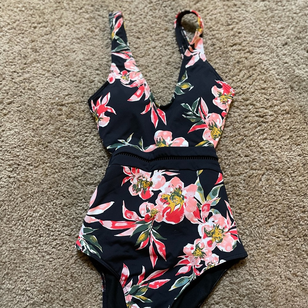 Roxy open back one piece.